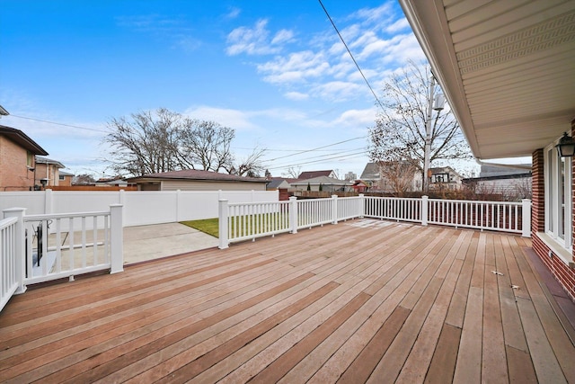 wooden terrace featuring a patio