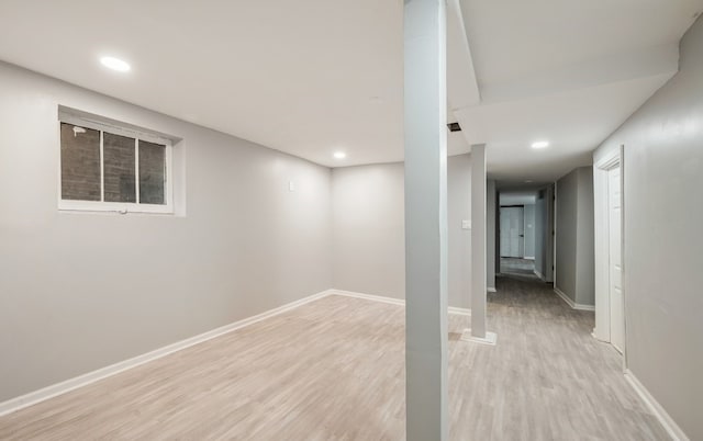 basement featuring light wood-type flooring