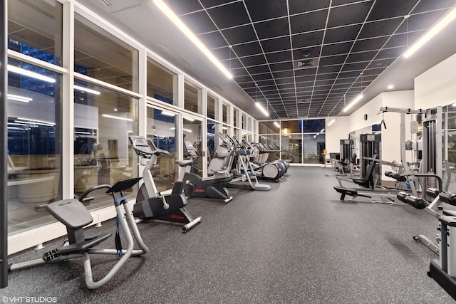 exercise room with a wall of windows