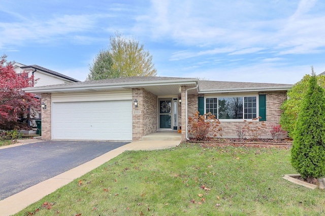 ranch-style home with a garage and a front yard