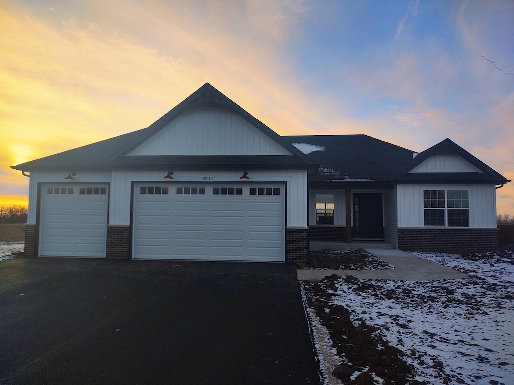 view of front of property with a garage