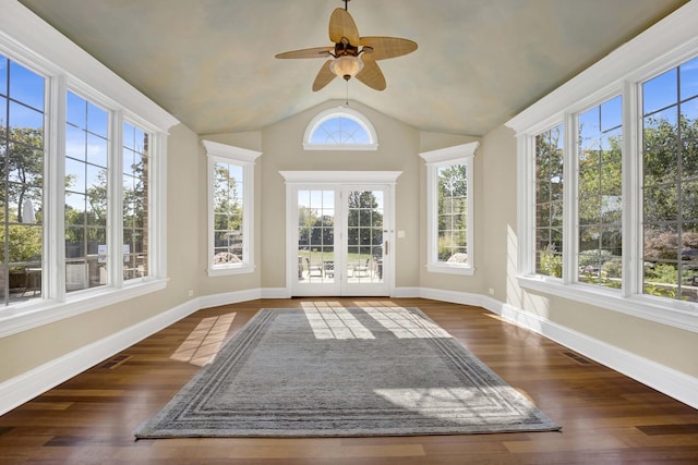 unfurnished sunroom featuring lofted ceiling, visible vents, and ceiling fan