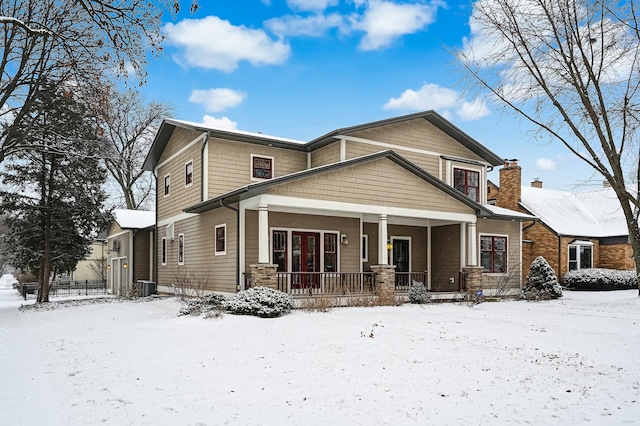 exterior space with cooling unit and covered porch