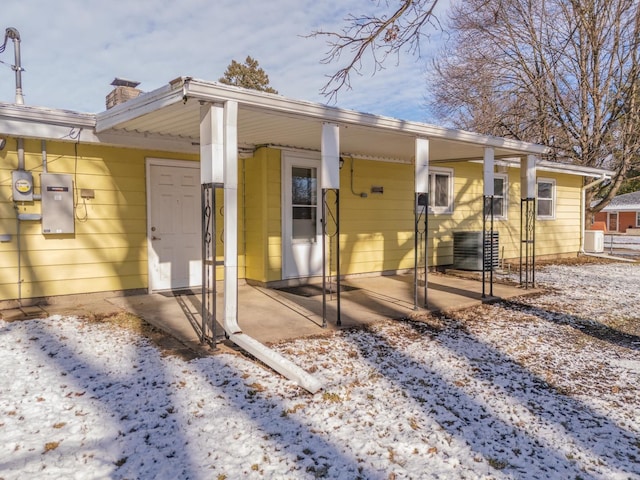 view of snow covered property