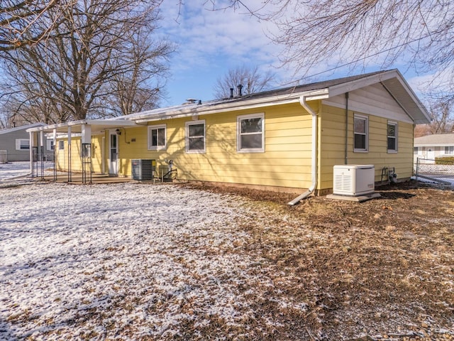 back of property featuring central air condition unit