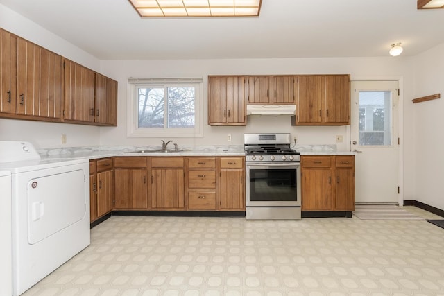 kitchen featuring stainless steel gas stove and sink