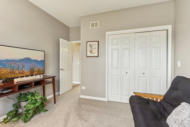 sitting room with light colored carpet