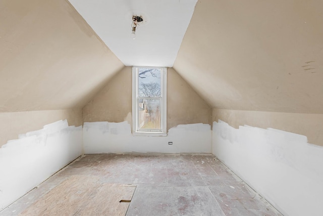 bonus room with vaulted ceiling