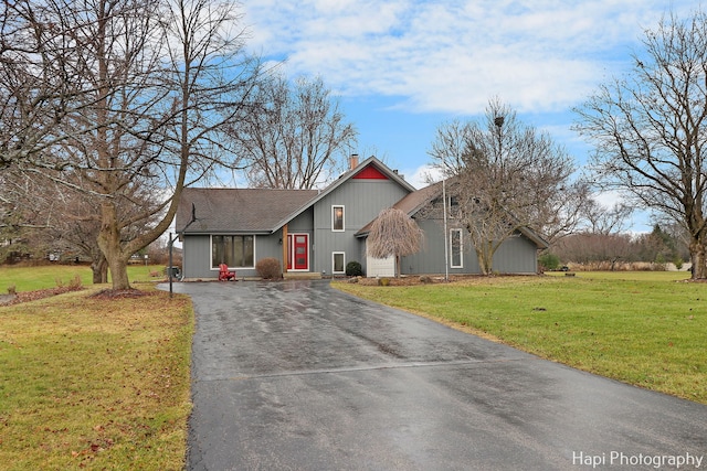 single story home with a front yard