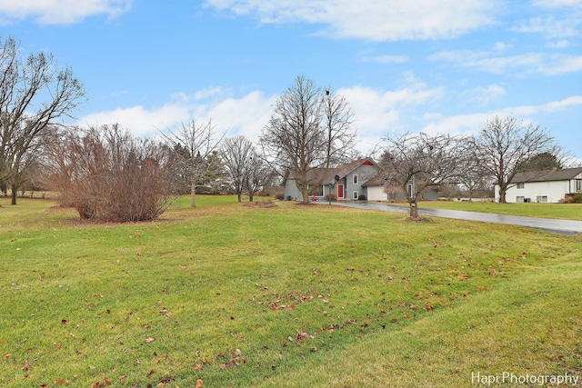 view of yard featuring a garage