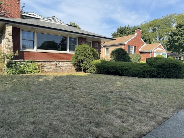 view of property exterior featuring a yard