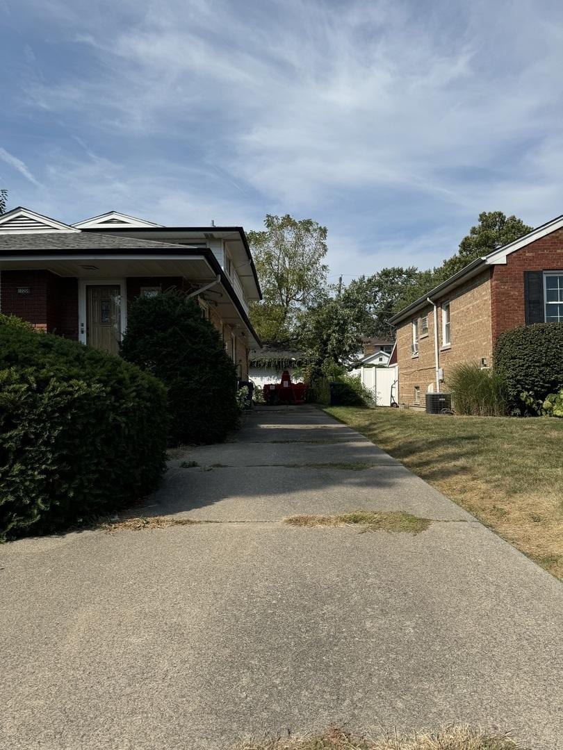 view of home's exterior featuring central AC