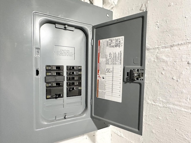 utility room featuring electric panel