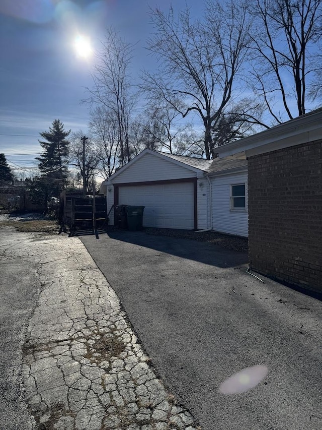 view of property exterior featuring a garage