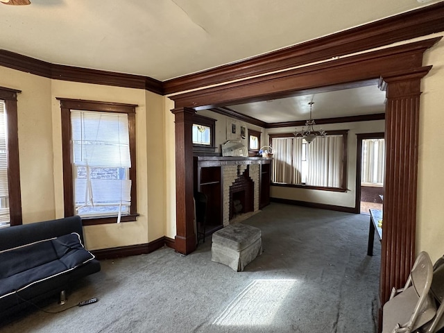 unfurnished living room featuring a wealth of natural light, dark carpet, and a brick fireplace