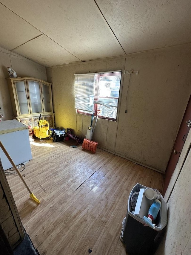 miscellaneous room featuring hardwood / wood-style flooring