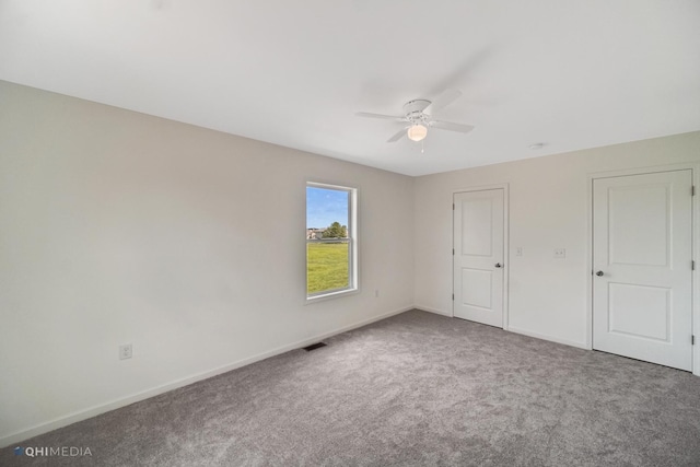 unfurnished bedroom featuring carpet flooring and ceiling fan