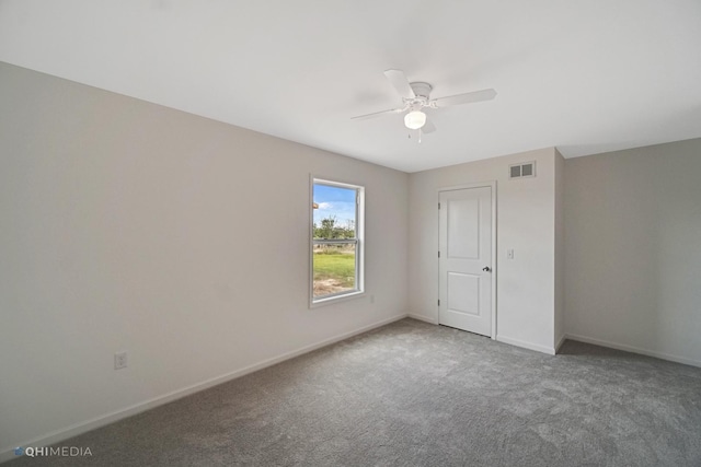 unfurnished bedroom featuring carpet and ceiling fan