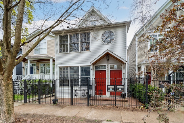 3022 N Hamilton Ave, Chicago, IL 60618 - view of front facade featuring a gate and a fenced front yard