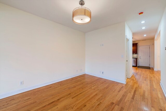 3022 N Hamilton Ave, Chicago, IL 60618 - unfurnished room featuring recessed lighting, light wood-type flooring, and baseboards