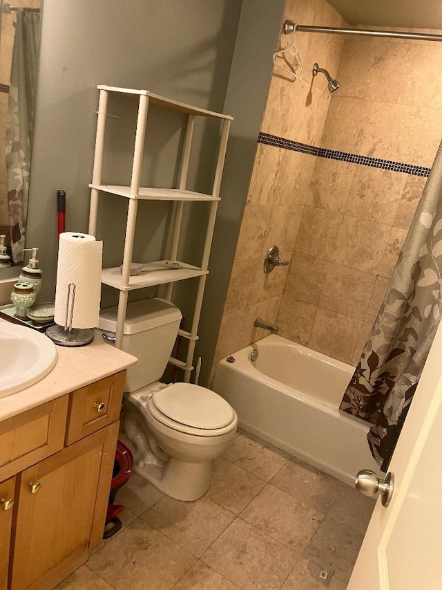 full bathroom featuring shower / bath combo, toilet, and vanity