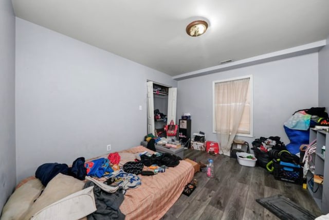 bedroom featuring hardwood / wood-style flooring