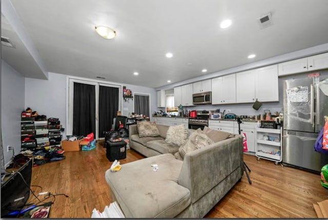 living room with light wood-type flooring