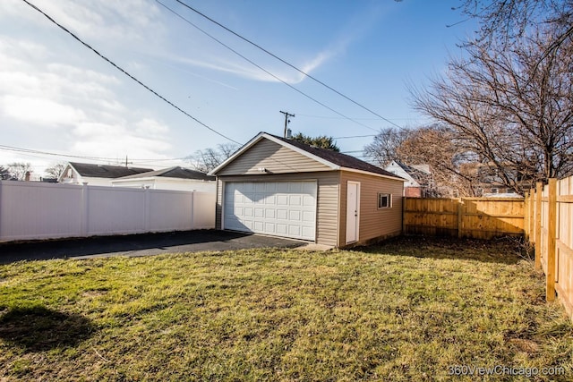 garage with a yard