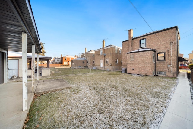 view of yard with central AC unit