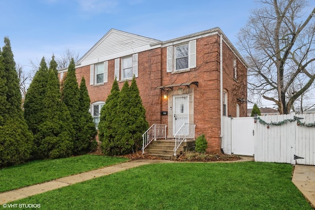 view of front facade with a front lawn