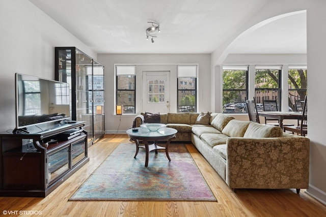 living room with light hardwood / wood-style flooring