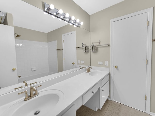 bathroom with tile patterned floors and vanity