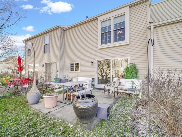 back of house featuring a patio area