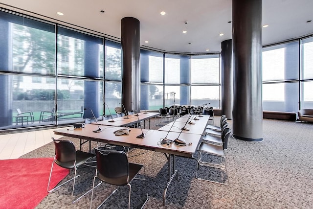 dining space featuring expansive windows