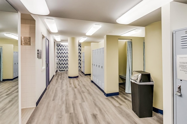 hallway with light wood-type flooring