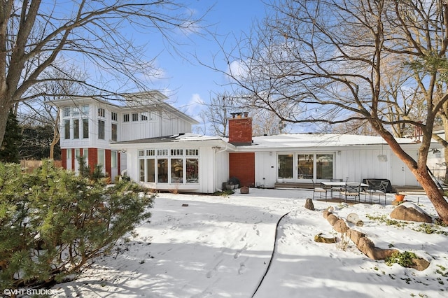 view of snow covered property