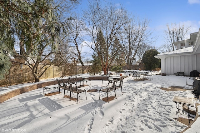 view of snow covered deck