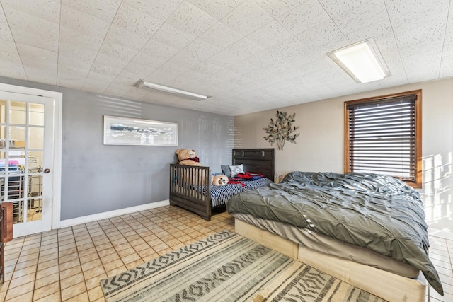 bedroom featuring multiple windows