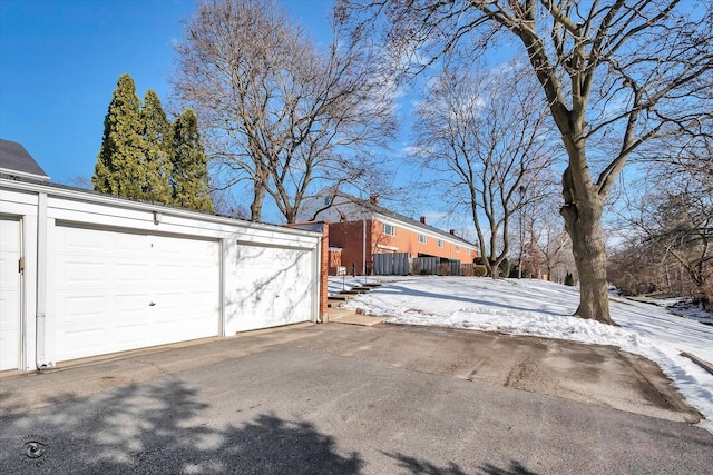 view of snow covered garage