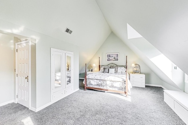 carpeted bedroom featuring vaulted ceiling