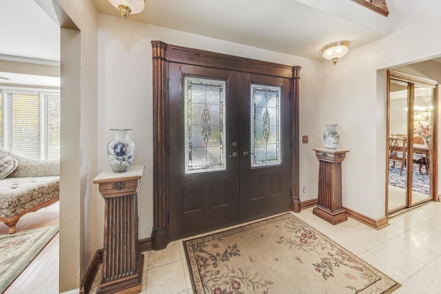 tiled entryway with french doors