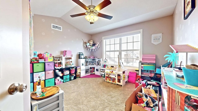 game room with carpet, ceiling fan, and vaulted ceiling