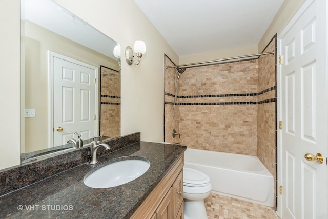 full bathroom featuring vanity, toilet, and tub / shower combination