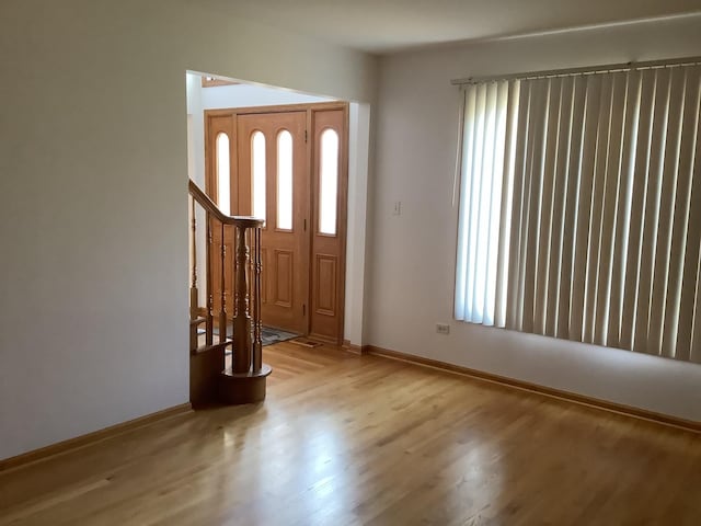 entrance foyer with light wood-type flooring