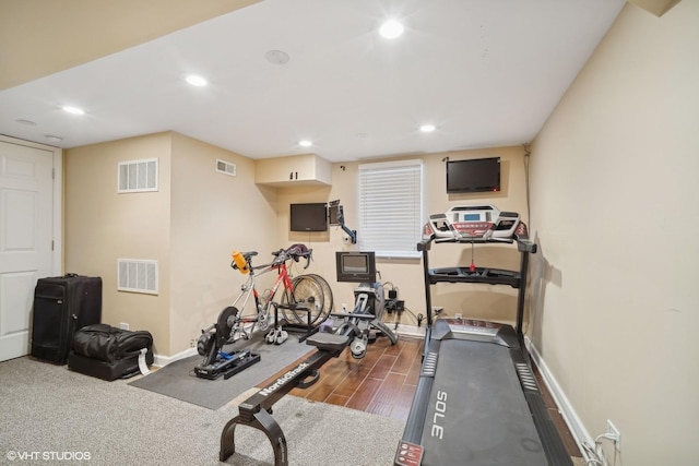 workout room featuring dark hardwood / wood-style floors