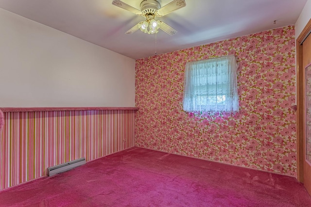 unfurnished room with ceiling fan, carpet floors, and a baseboard heating unit