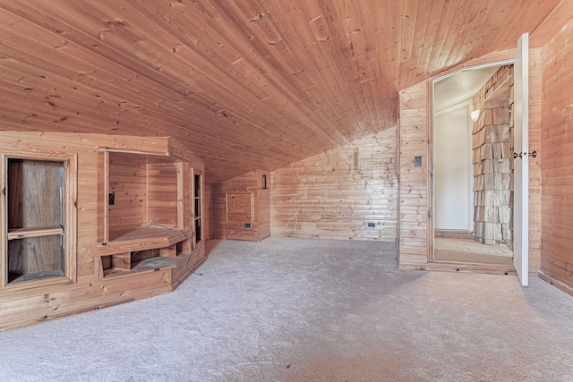 bonus room featuring wood walls, carpet, wood ceiling, and lofted ceiling