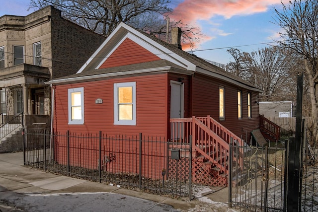 view of property exterior at dusk