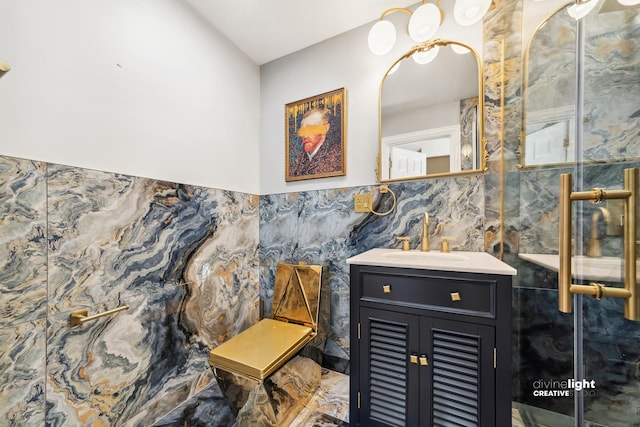 bathroom with vanity and tile walls