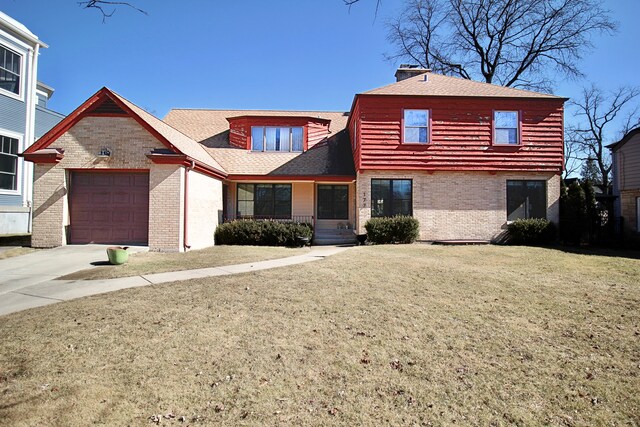 view of front of home with a garage and central AC